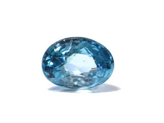 Oval-cut natural blue gemstone isolated on white background, faceted and sparkling.
